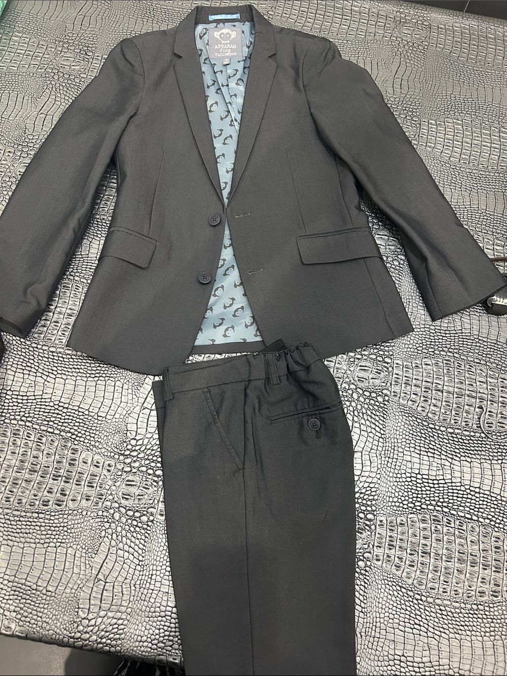 Black Two-Piece boys Suit with Patterned Lining like new